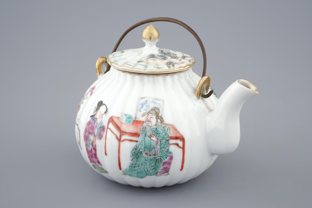 A Chinese famille rose teapot and cover, 19th C.
